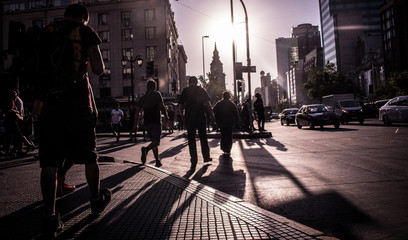 people walking on the street at night