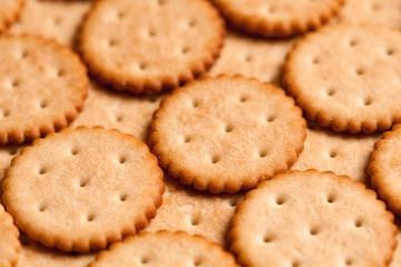 Background of round crackers. Close up
