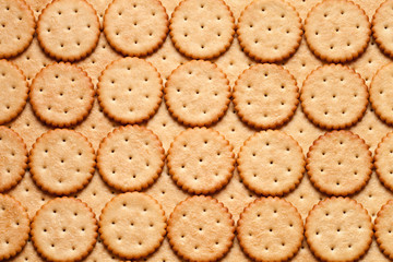 Background of many round crackers.