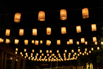 lamps paper lanterns are hanging in Yee peng and Loy krathong festival © sutlafk
