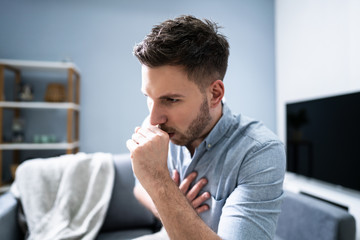 Man Suffering From Cough