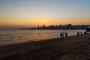 Sunset on Chowpatty beach in Mumbai. India