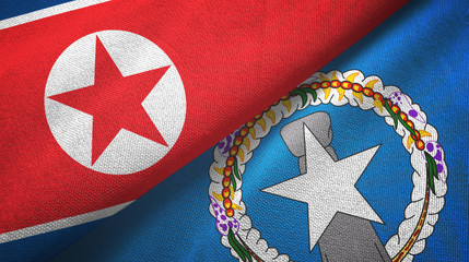 North Korea and Northern Mariana Islands two flags textile cloth, fabric texture