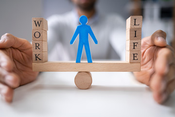 Businessperson Protecting Work And Life Balance