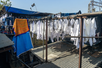 Clothes dry on rope in Dhobi Ghat is outdoor laundry in Mumbai. India