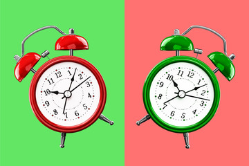 Two colored alarm clocks on a background of colored squares of the opposite color.