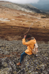 young motivated tourist taking off his hat, side view photo. copy space