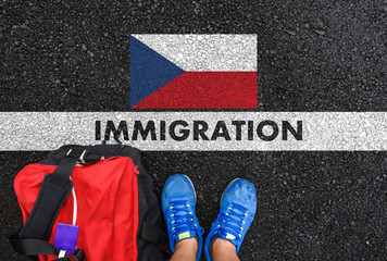 Man in shoes with bag standing next to line with word IMMIGRATION and flag of Czech Republic on...