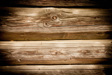 Old rich dirty cracked wood wall texture and background with knots.