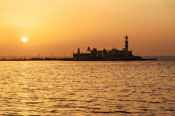 Fototapeta premium Haji Ali Dargah mosque and tomb on sunset. Mumbai. India