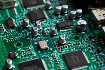 Fototapeta na wymiar printed circuit Board with chips and radio components electronics