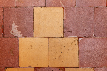 old tiles with cracks and scuffs