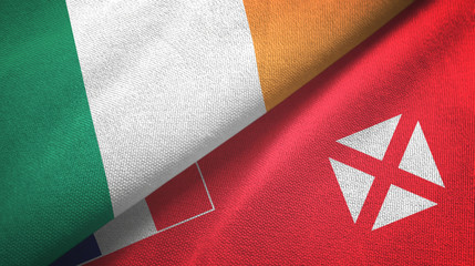 Ireland and Wallis and Futuna two flags textile cloth, fabric texture