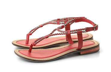 Pair of leather red female sandals
