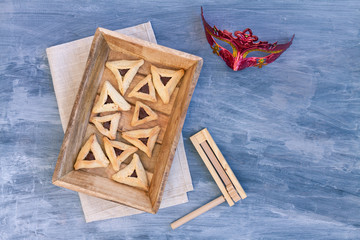 Jewish Hamantaschen homemade biscuits or cookies with chocolate. Top view or overhead composition with copy space