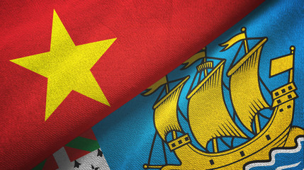 Vietnam and Saint Pierre and Miquelon two flags textile cloth, fabric texture