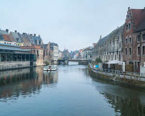 Fototapeta premium the city of Belgium , Ghent with the river and the landmark buildings crossing and feels like being in medieval era 