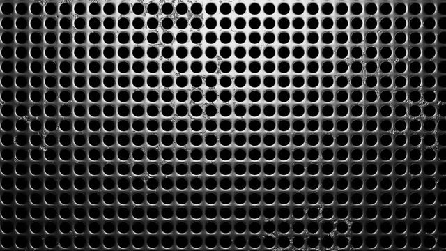 Perforated  metal on black background