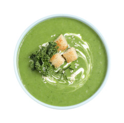 Tasty kale soup with croutons isolated on white, top view