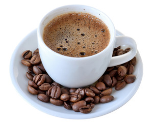 Cup of hot coffee and a scattering of coffee beans isolated