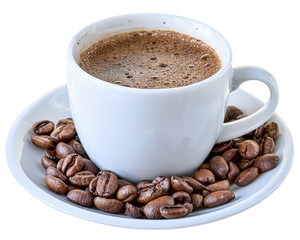 Cup of hot coffee and a scattering of coffee beans isolated