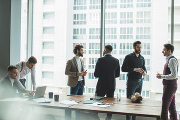 business men coworking in office, business crew consisted of young men leaders have brainstorming...