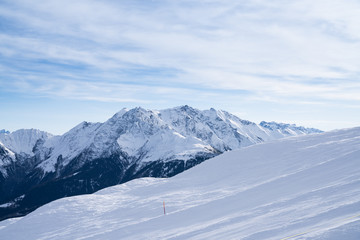 Fototapeta na wymiar Winter Landscape Of A Ski Resort In The Alps