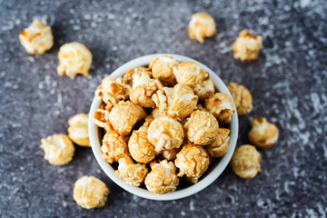 Caramel sweet Popcorn in a white bowl