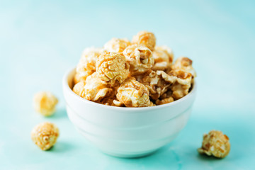 Caramel sweet Popcorn in a white bowl