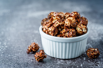 Chocolate caramel sweet Popcorn in a white bowl