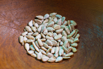 wooden bowl with sunflower seeds