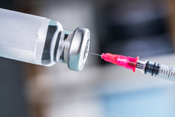 Filling Shingles Vaccine Syringe