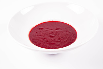 Beetroot cream soup on a white background