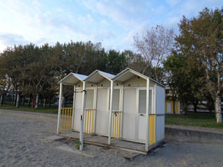 a wooden hut on the beach