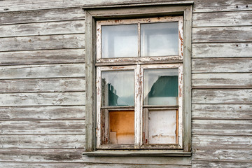 Obraz na płótnie Canvas Broken glass in a window frame.