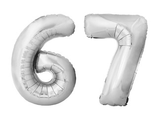 Number 67 sixty seven made of silver inflatable balloons isolated on white background. Silver chrome helium balloons forming 67 sixty seven number