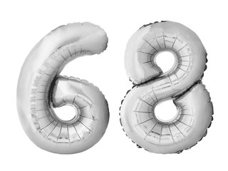 Number 68 sixty eight made of silver inflatable balloons isolated on white background. Silver chrome helium balloons forming 68 sixty eight number
