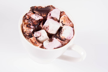 Cup of hot chocolate with marshmallows on a white background	