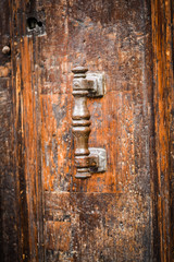ancient doors close up within the historical streets of Rome