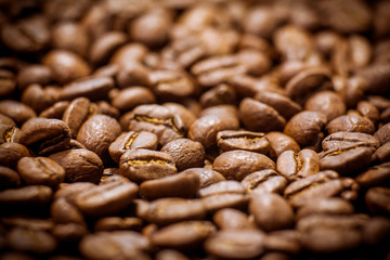 Brown coffee beans, of coffee beans for background and texture. Beans of roasted black coffee. Background.