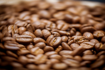 Beans of roasted black coffee. Background. Brown coffee beans, of coffee beans for background and...