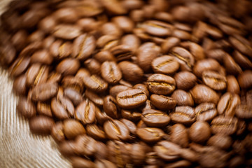 Brown coffee beans, of coffee beans for background and texture. Beans of roasted black coffee....