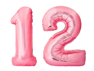 Number 12 twelve made of rose gold inflatable balloons isolated on white background. Pink helium balloons forming 12 twelve number - obrazy, fototapety, plakaty