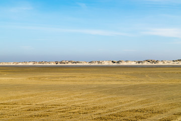 Fototapeta na wymiar view of beach with blue sky and clouds