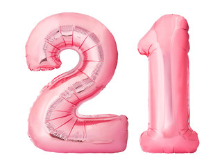 Number 21 twenty one made of rose gold inflatable balloons isolated on white background. Pink...