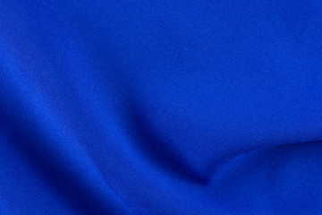 Blue fabric close-up. Beautiful background for designers.