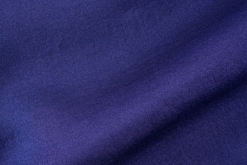 Blue fabric close-up. Beautiful background for designers.