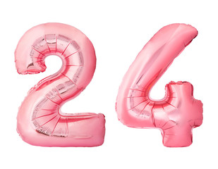 Number 24 twenty four made of rose gold inflatable balloons isolated on white background. Pink...