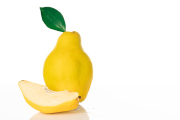 yellow ripe quince on white background