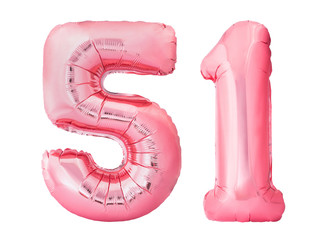 Number 51 fifty one made of rose gold inflatable balloons isolated on white background. Pink helium balloons forming 51 fifty one number